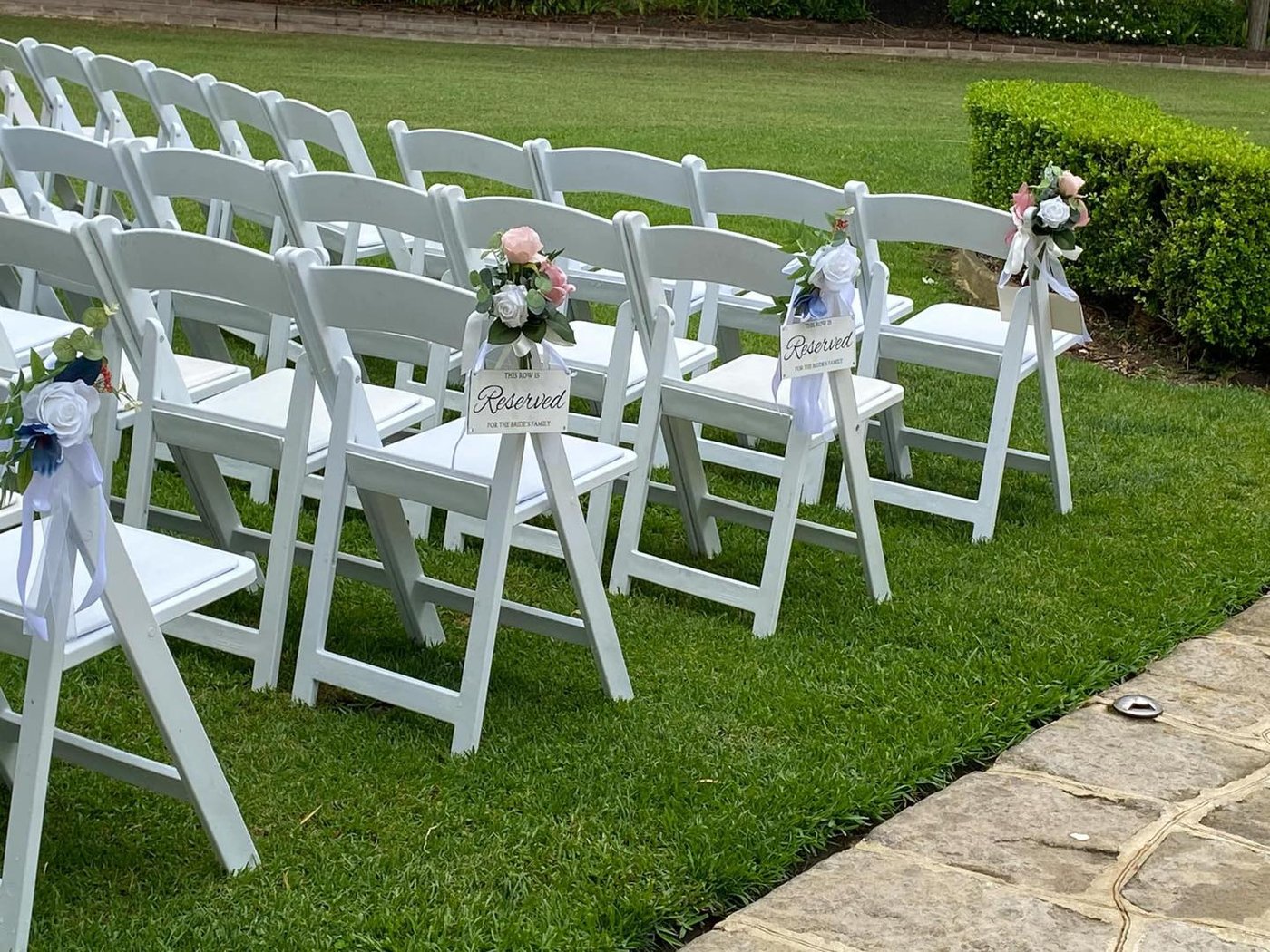 Reserved row chairs with florals