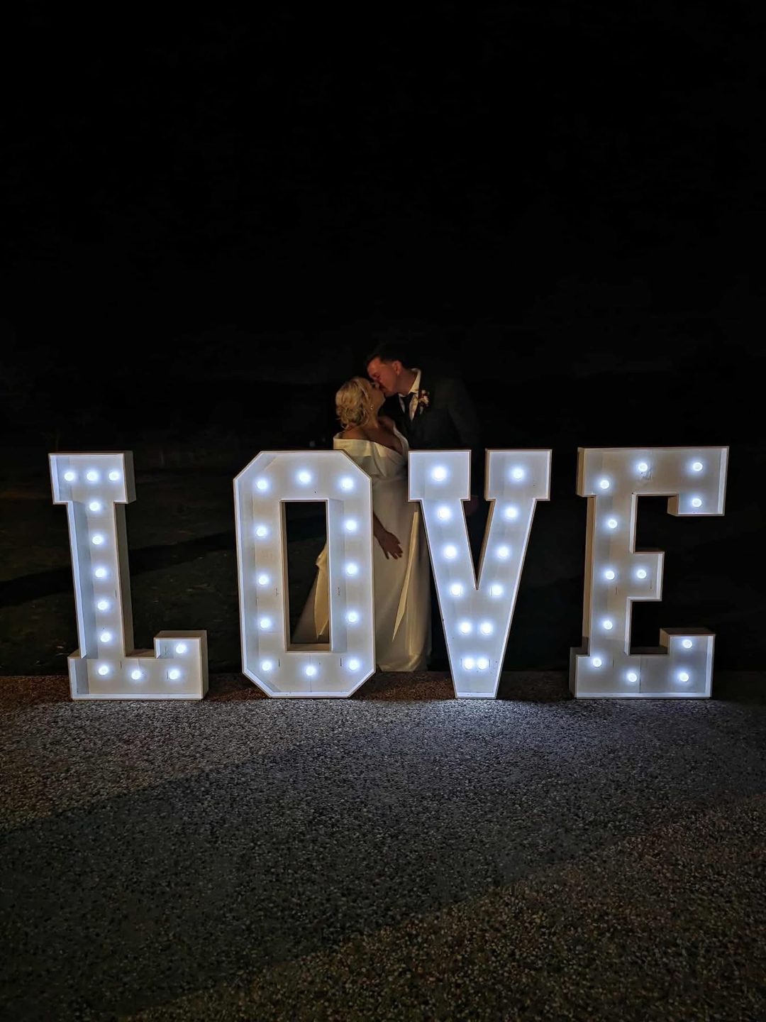 LOVE letter lights at an evening reception